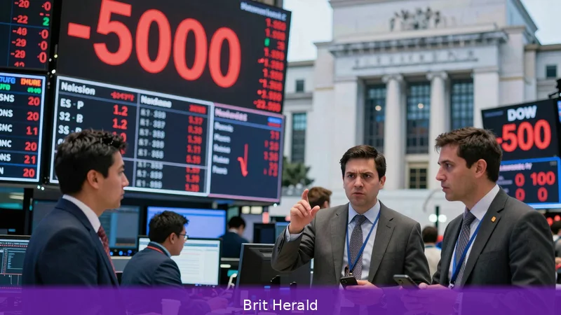 Fed holds rates at 3.50%-3.75% as Dow drops about 500 points